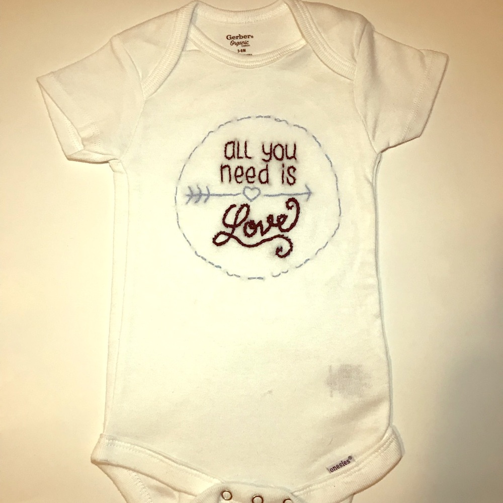 Hand embroidered onesie